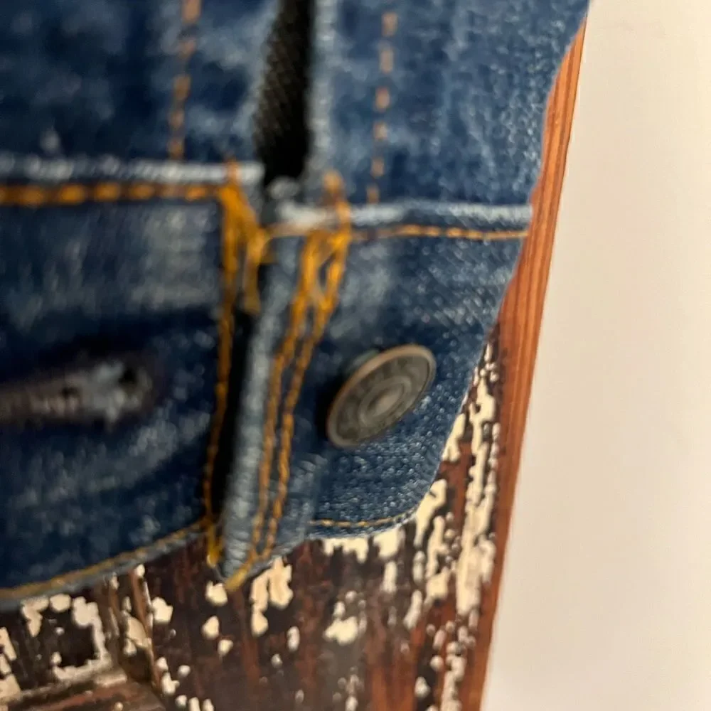 Vintage Levi’s Denim Trucker Jean Jacket Youth size 16 womenS/M.